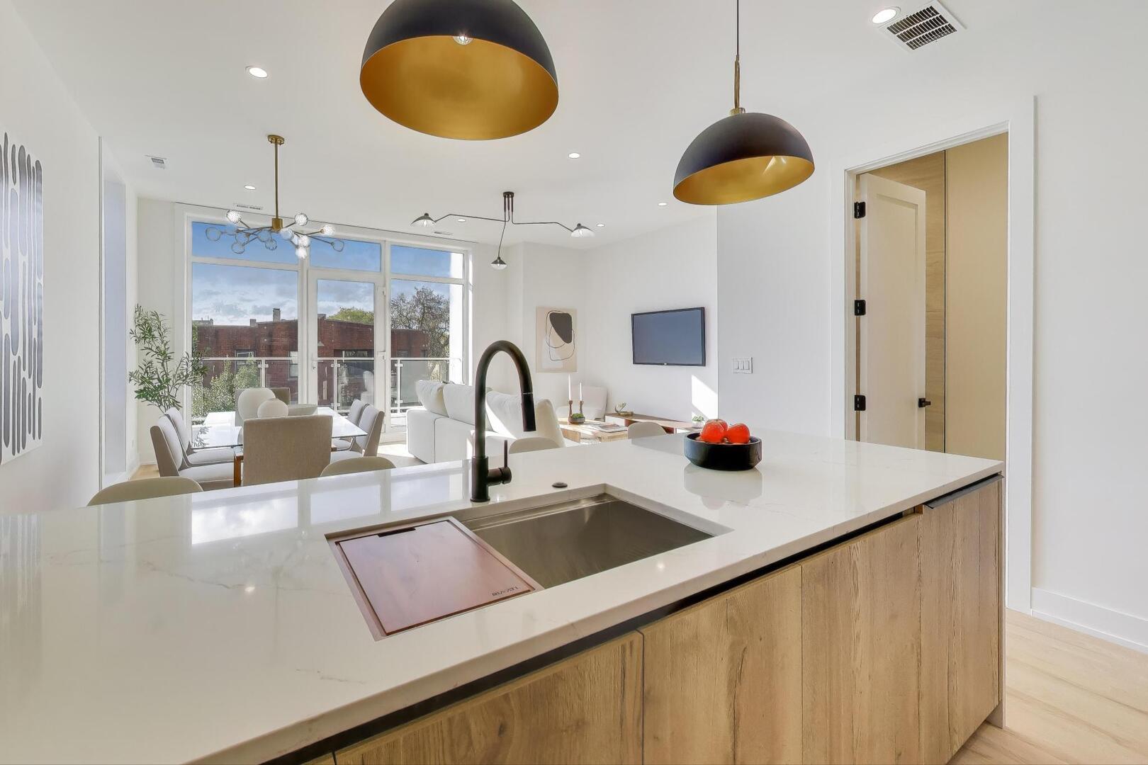 2456 West Cortez Street, Unit 3E Chicago, IL 60622 - Photo 16 of 46 a kitchen with a sink cabinets and a window