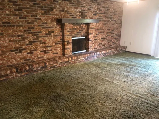 a room with a fireplace