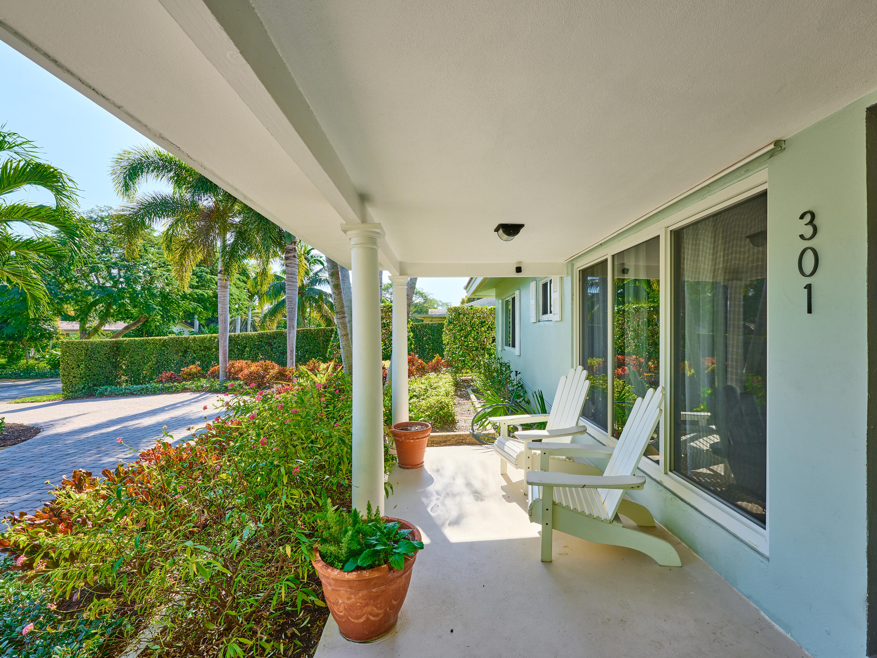 301 Northwest 3rd Court Boca Raton, FL 33432 - Photo 41 of 45 a garden view with a seating space
