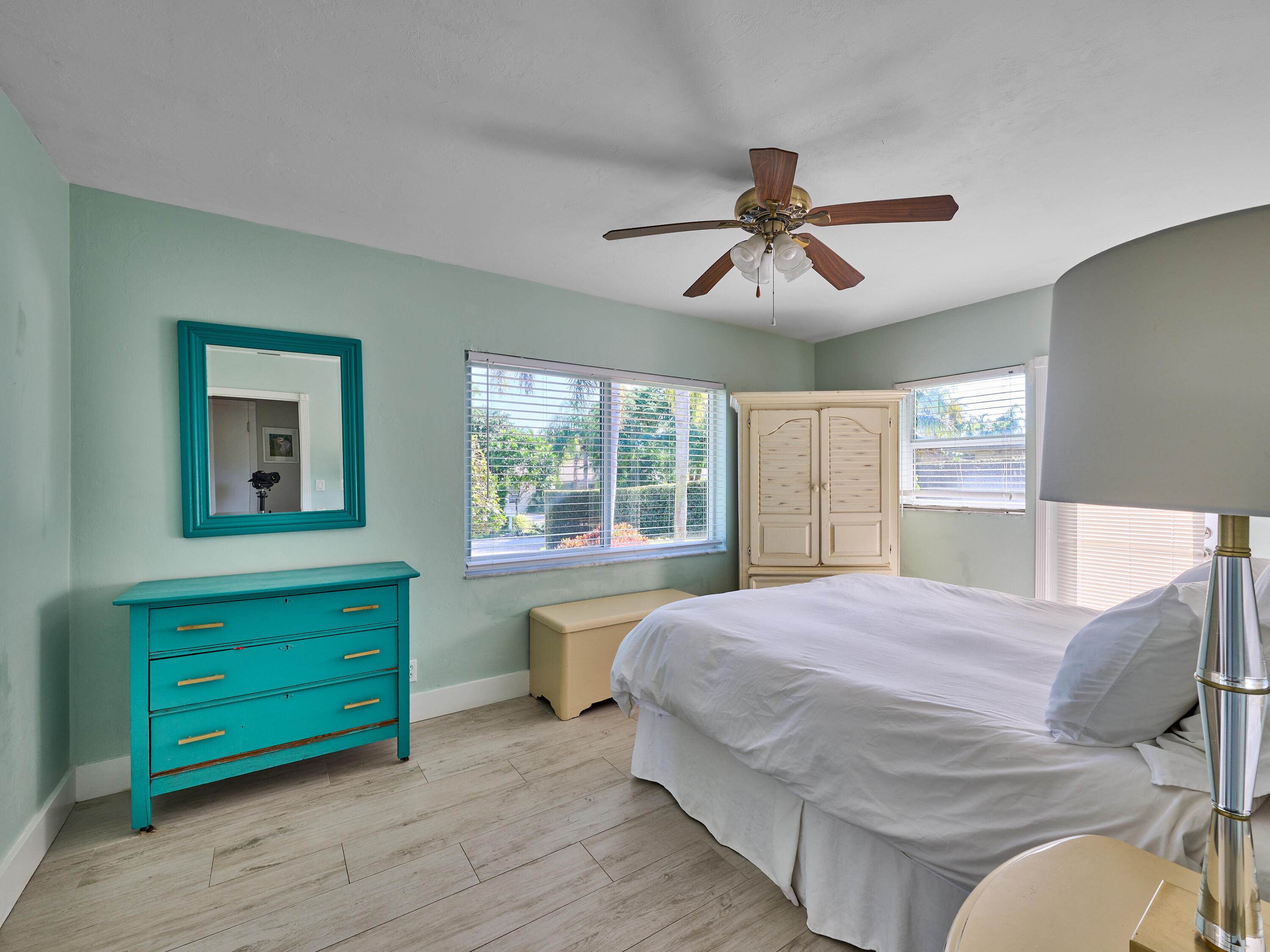 301 Northwest 3rd Court Boca Raton, FL 33432 - Photo 10 of 45 a bedroom with a bed dresser and a window