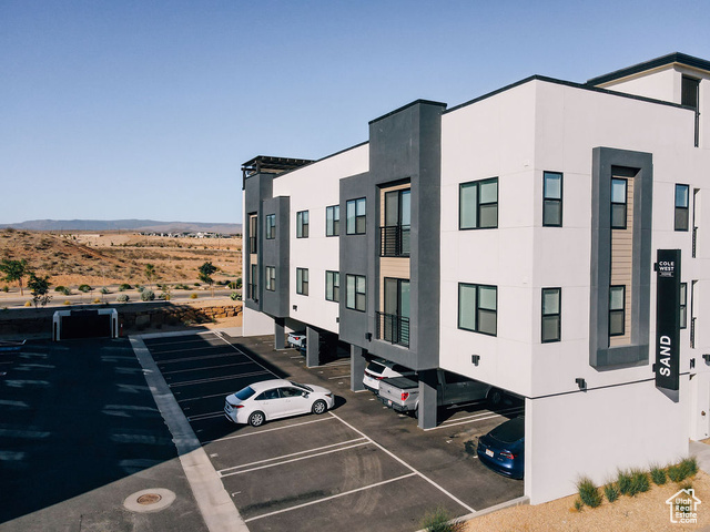 961 West Akoya Pearl Road, Unit 201 St. George, UT 84790 - Photo 4 of 67 View of property featuring uncovered parking