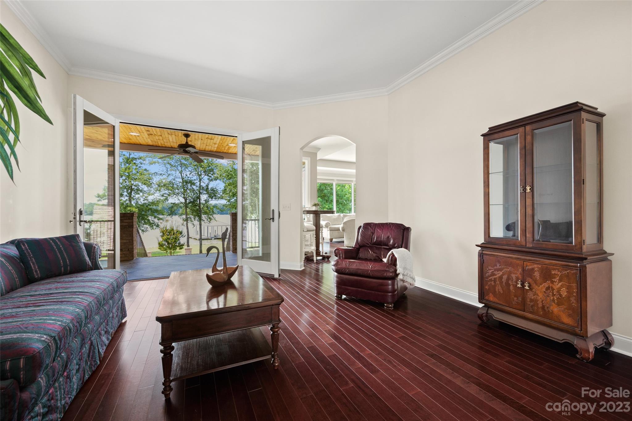 10285 Lakeshore Drive Lancaster, SC 29720 - Photo 17 of 48 a living room with furniture and a floor to ceiling window