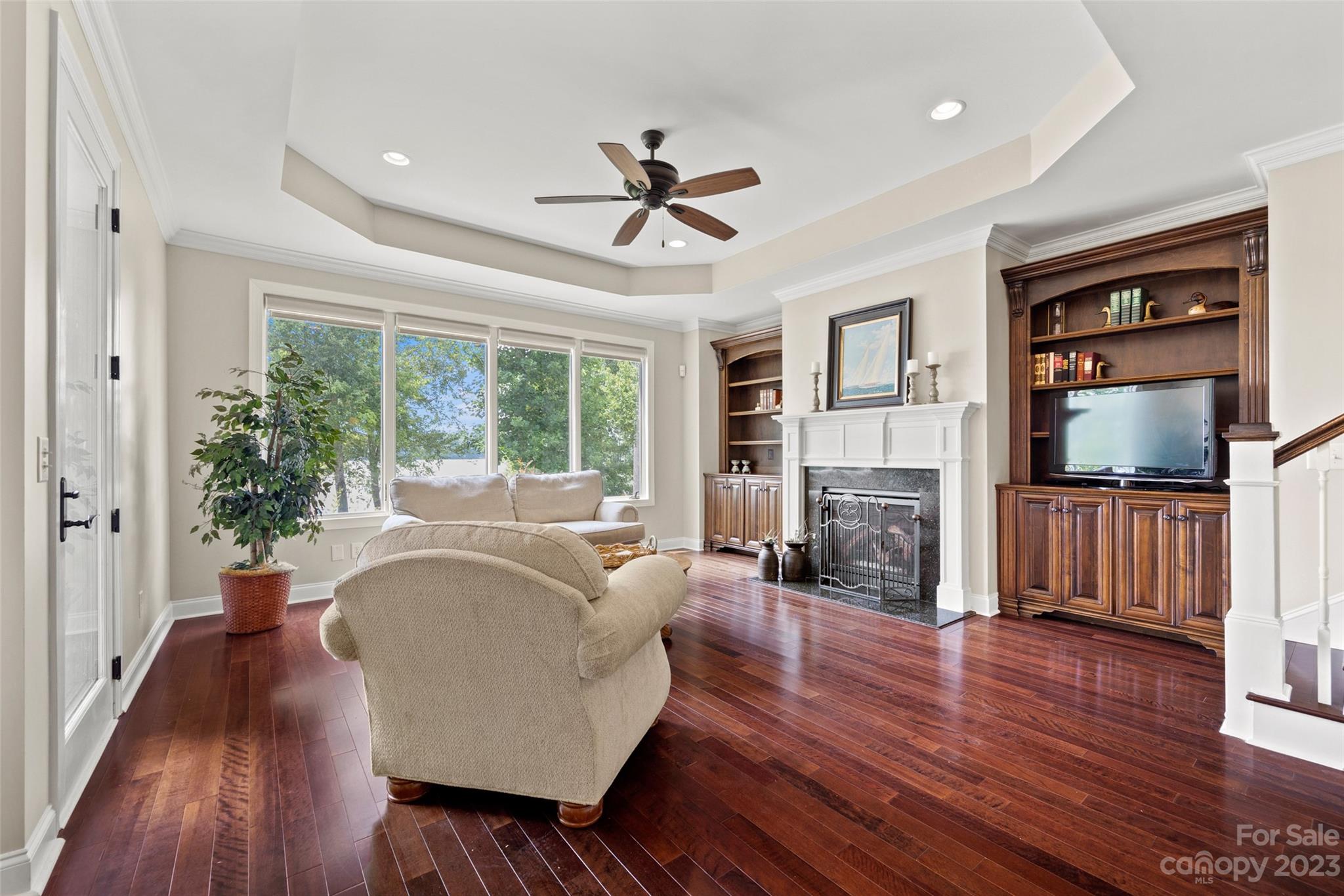 10285 Lakeshore Drive Lancaster, SC 29720 - Photo 23 of 48 a living room with fireplace furniture and a wooden floor