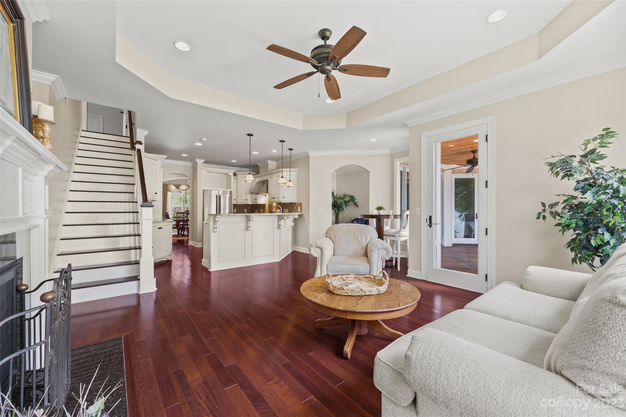 10285 Lakeshore Drive Lancaster, SC 29720 - Photo 24 of 48 a living room with furniture kitchen view and a chandelier