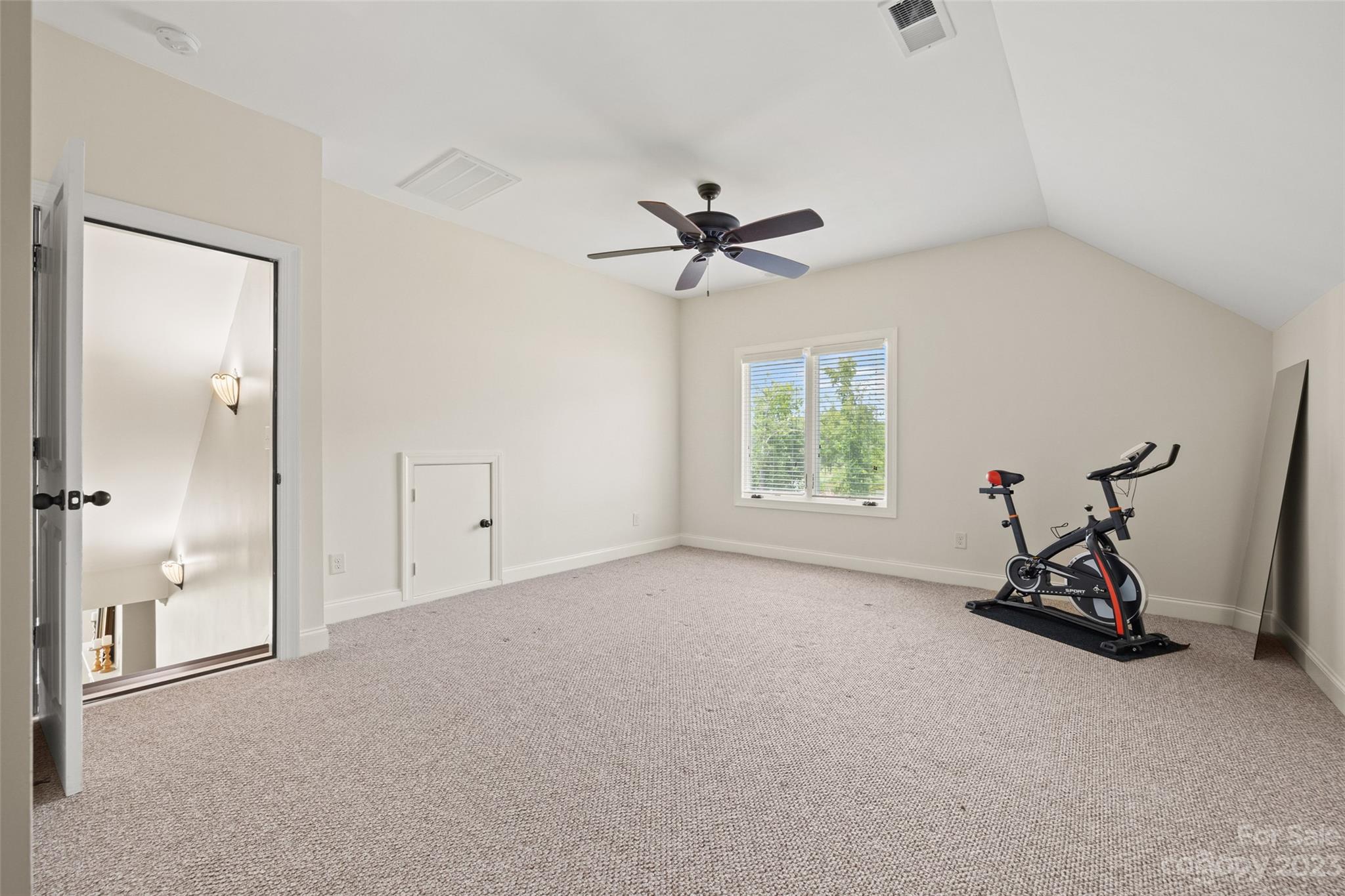 10285 Lakeshore Drive Lancaster, SC 29720 - Photo 37 of 48 an empty room with closet and windows