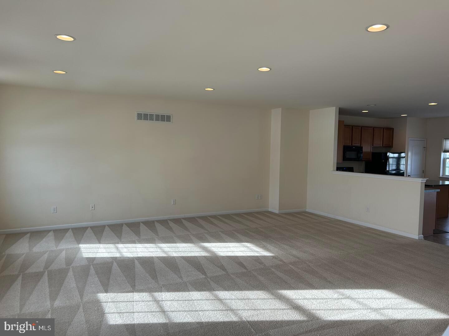 475 Toftrees Drive Middletown, DE 19709 - Photo 4 of 11 a view of wooden floor and windows in a room