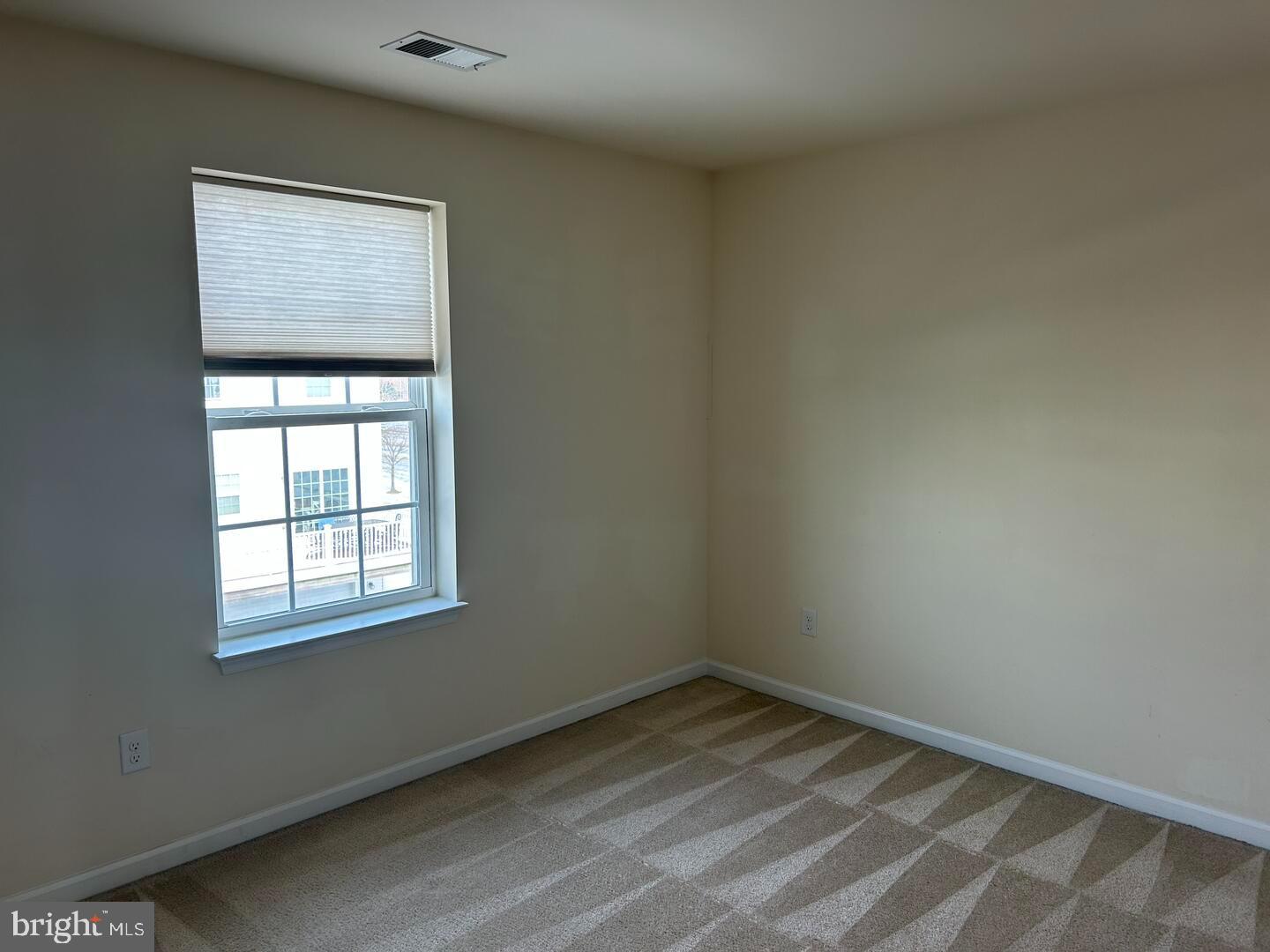 475 Toftrees Drive Middletown, DE 19709 - Photo 8 of 11 an empty room with a window