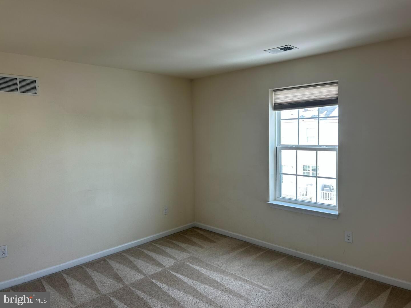 475 Toftrees Drive Middletown, DE 19709 - Photo 9 of 11 an empty room with a window