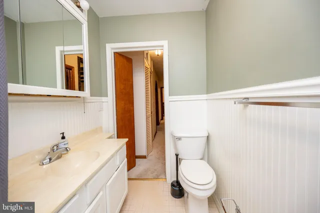 a view of a storage & utility room with dryer and washer