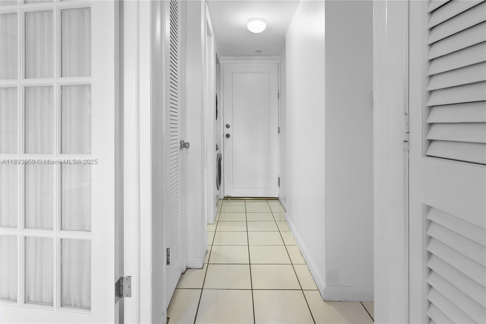 77 Crandon Boulevard, Unit 3C Key Biscayne, FL 33149 - Photo 20 of 34 a view of a hallway