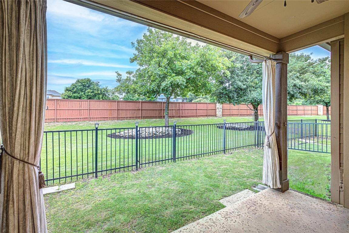 14001 Avery Ranch Boulevard, Unit 103 Austin, TX 78717 - Photo 24 of 29 a view of a backyard with a garden