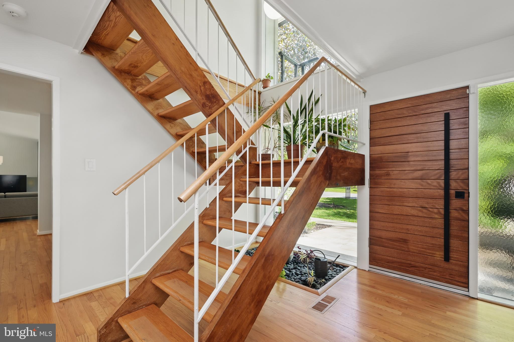 8024 Fenway Road Bethesda, MD 20817 - Photo 11 of 64 a view of entryway and hall with wooden floor