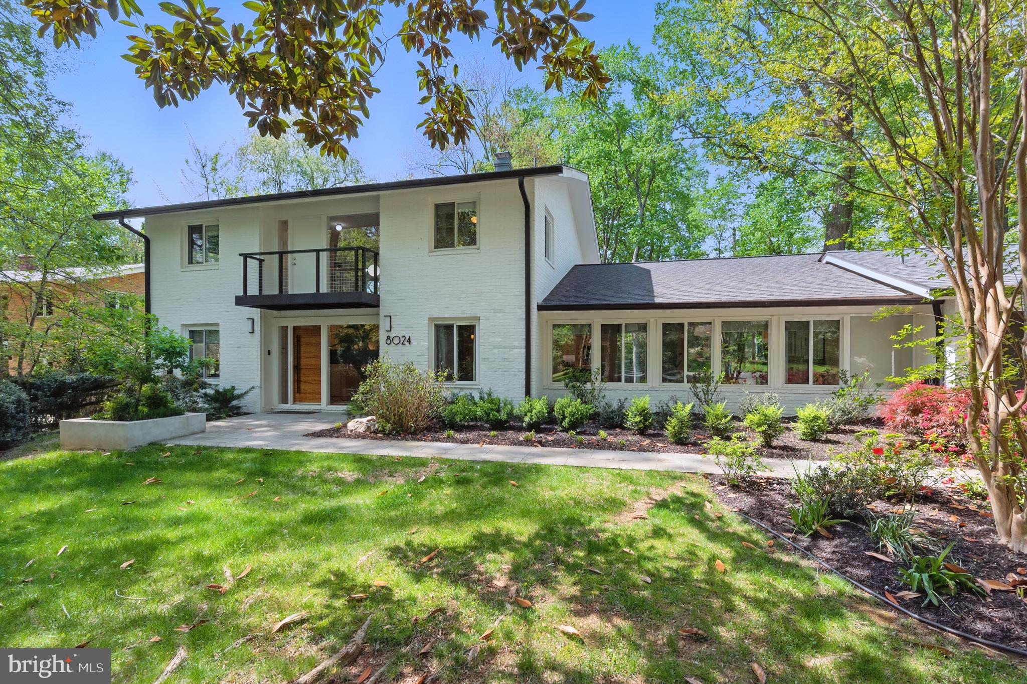 8024 Fenway Road Bethesda, MD 20817 - Photo 2 of 64 a front view of a house with a yard