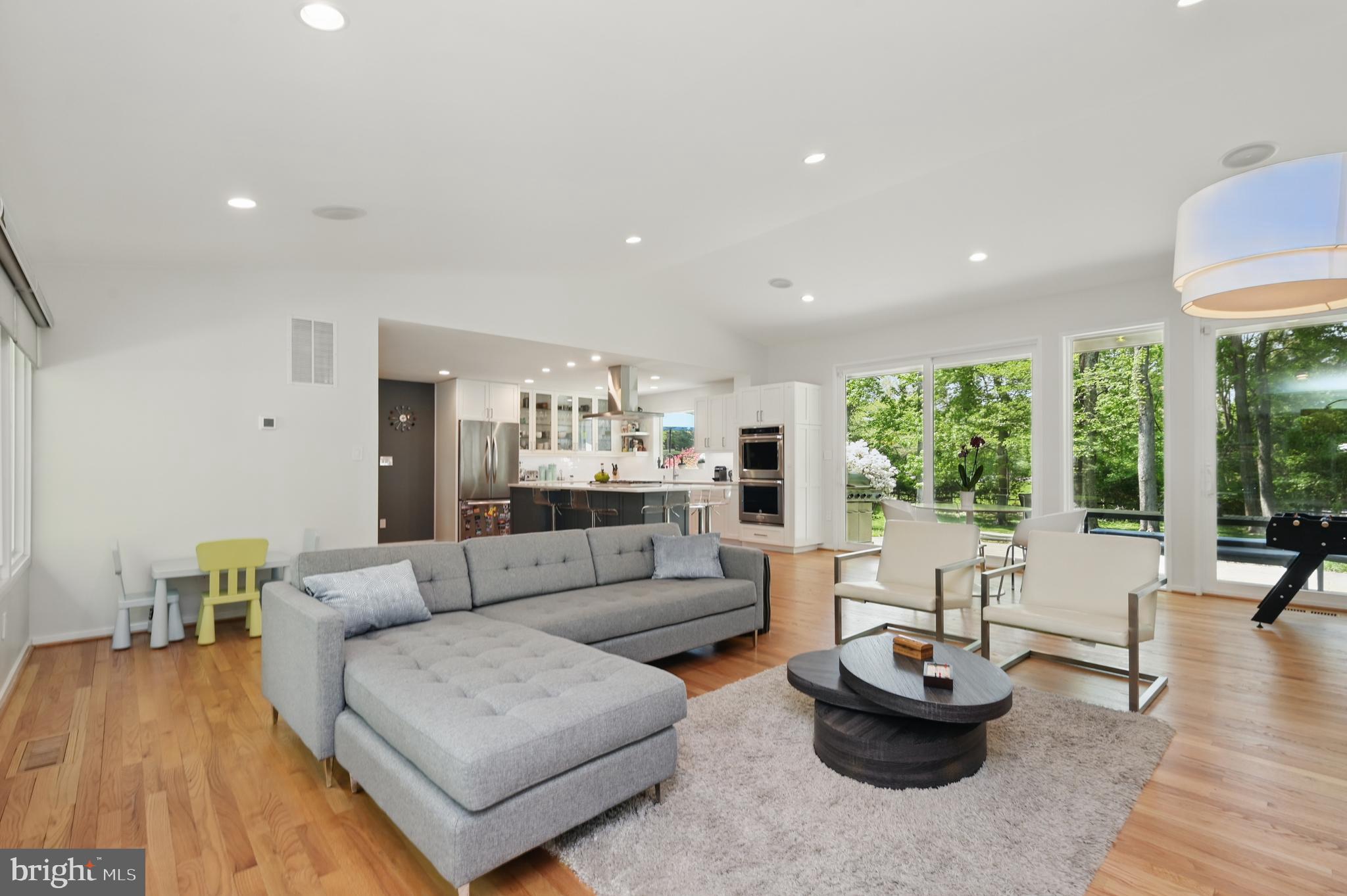 8024 Fenway Road Bethesda, MD 20817 - Photo 28 of 64 a living room with furniture and a large window