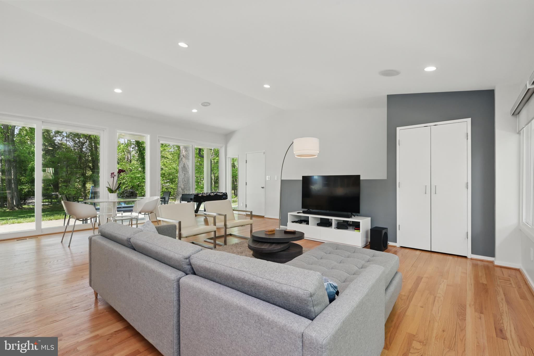 8024 Fenway Road Bethesda, MD 20817 - Photo 29 of 64 a living room with furniture and a flat screen tv