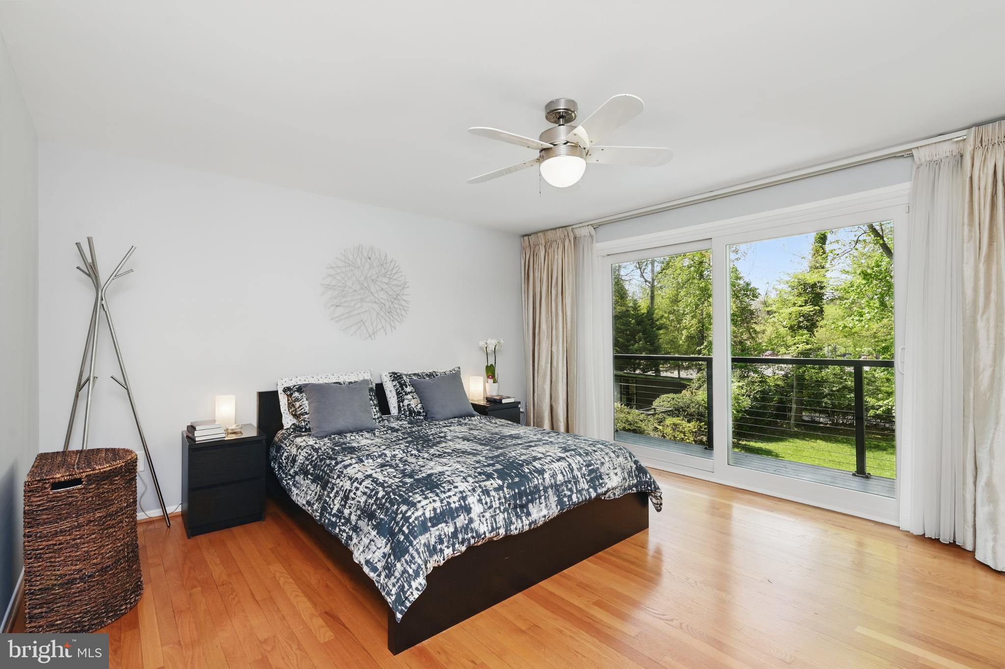 8024 Fenway Road Bethesda, MD 20817 - Photo 38 of 64 a bedroom with a large bed and a large window