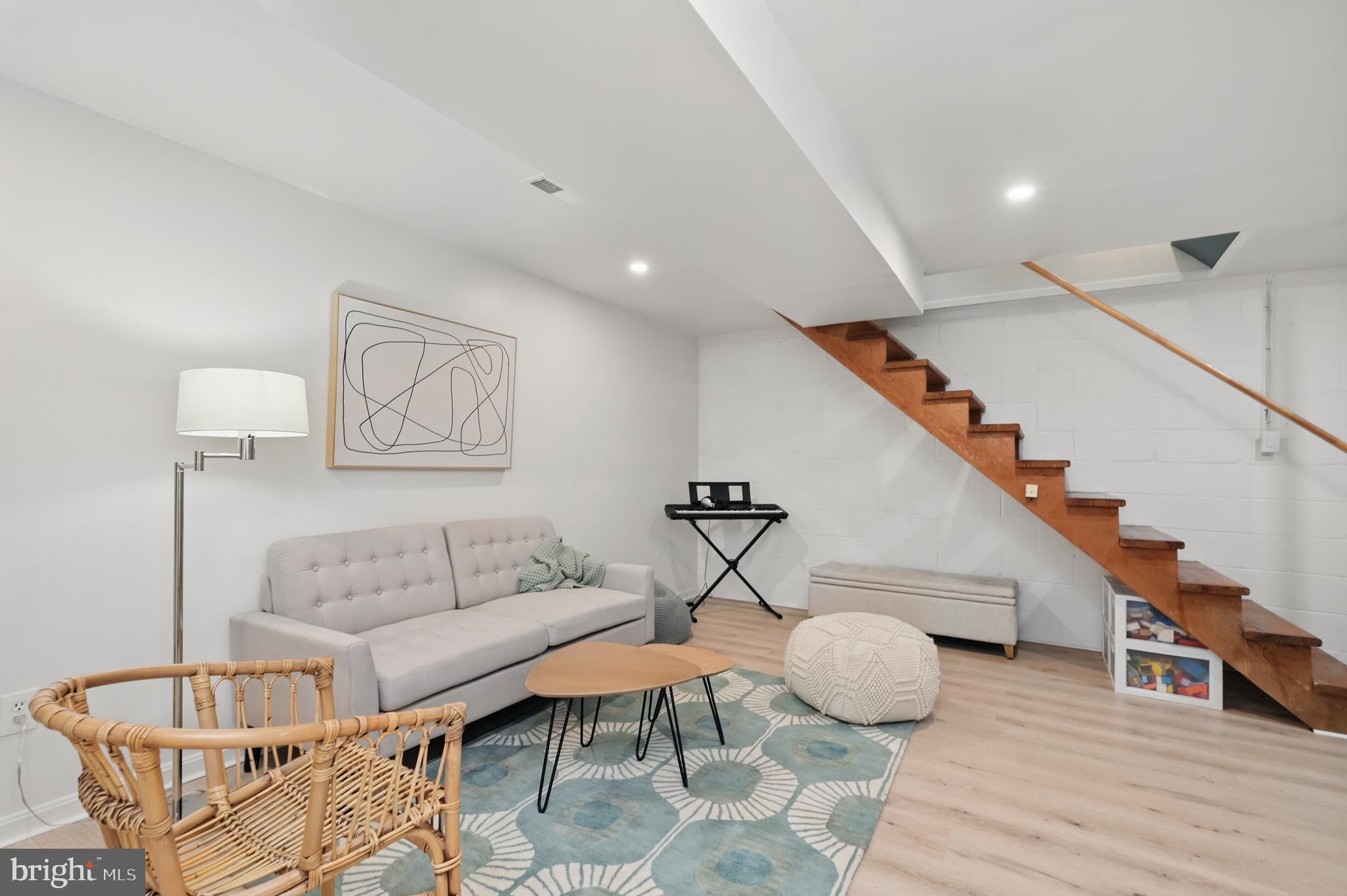 8024 Fenway Road Bethesda, MD 20817 - Photo 50 of 64 a living room with furniture and wooden floor