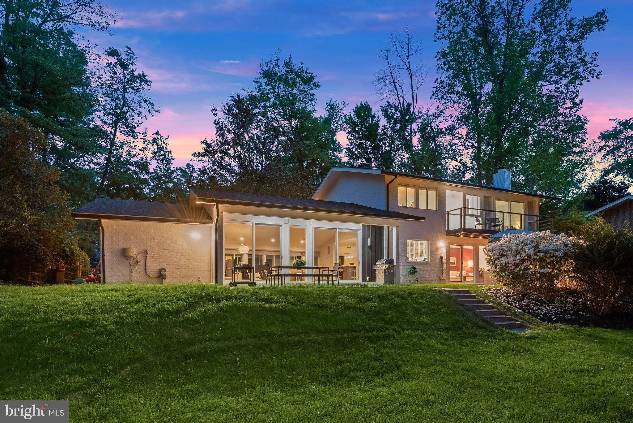 8024 Fenway Road Bethesda, MD 20817 - Photo 5 of 64 a front view of house with a garden