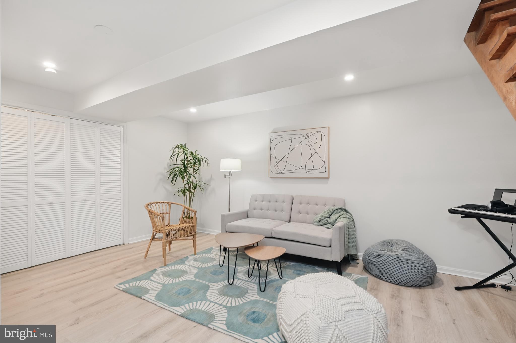 8024 Fenway Road Bethesda, MD 20817 - Photo 52 of 64 a living room with furniture a rug and a window