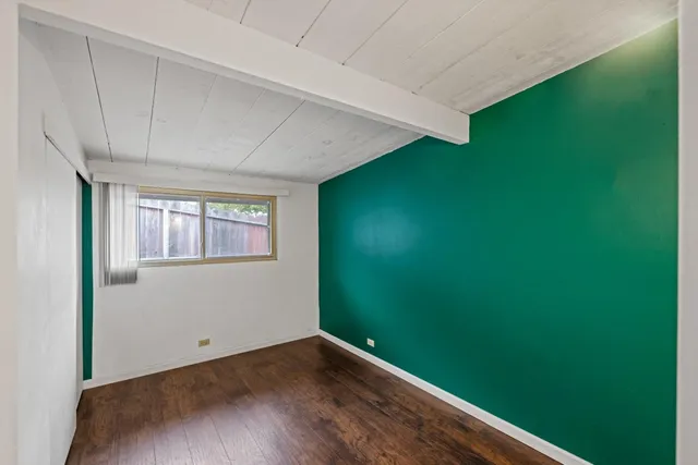 a view of a room with a window