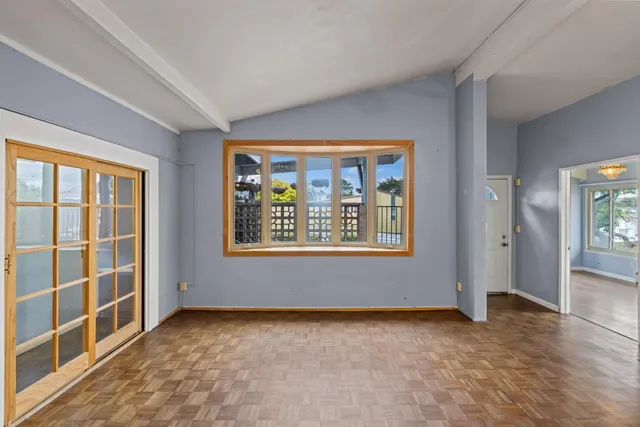 an empty room with windows