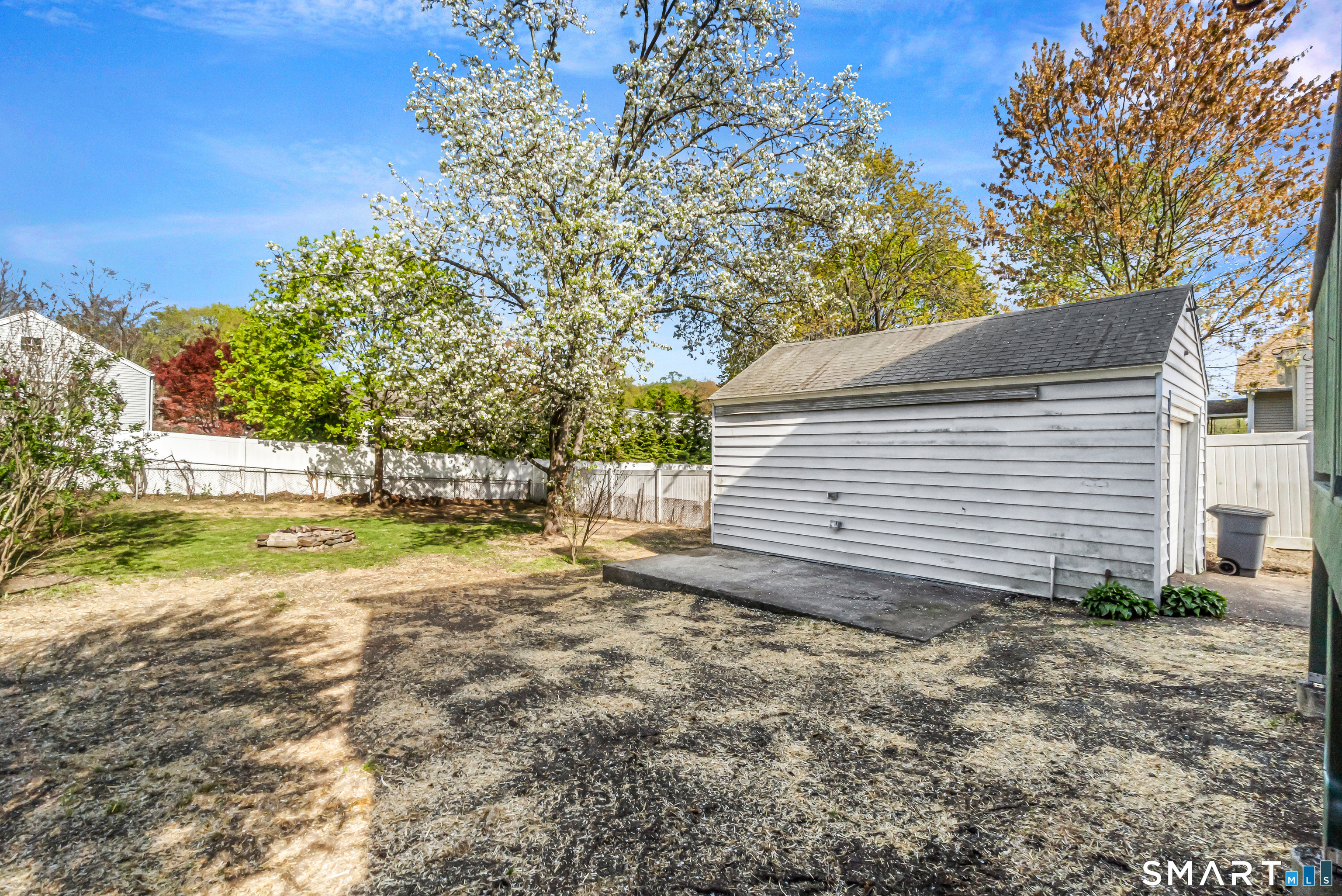 1770 Stratfield Road Fairfield, CT 06825 - Photo 38 of 40 a view of a backyard with large trees