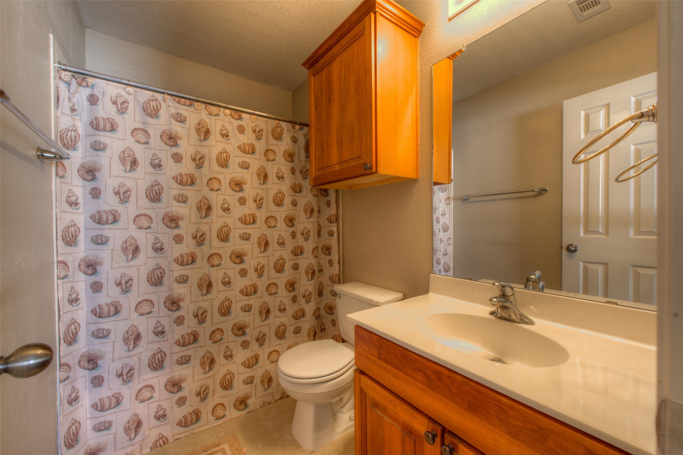 1148 Sundrop Place Round Rock, TX 78665 - Photo 18 of 19 a bathroom with a sink and a toilet