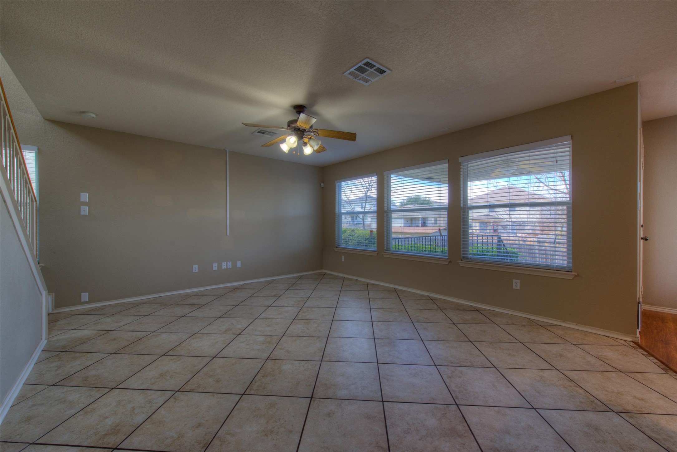 1148 Sundrop Place Round Rock, TX 78665 - Photo 5 of 19 a view of an empty room with a window