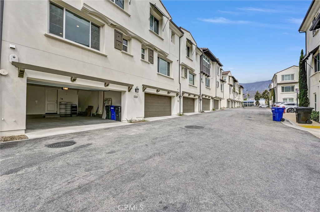 1245 Oliva Court Duarte, CA 91010 - Photo 21 of 23 a view of a building with car parked