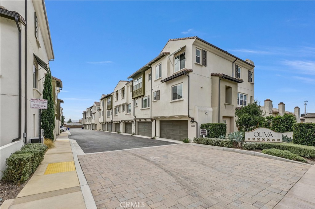 1245 Oliva Court Duarte, CA 91010 - Photo 22 of 23 a front view of a building with a yard