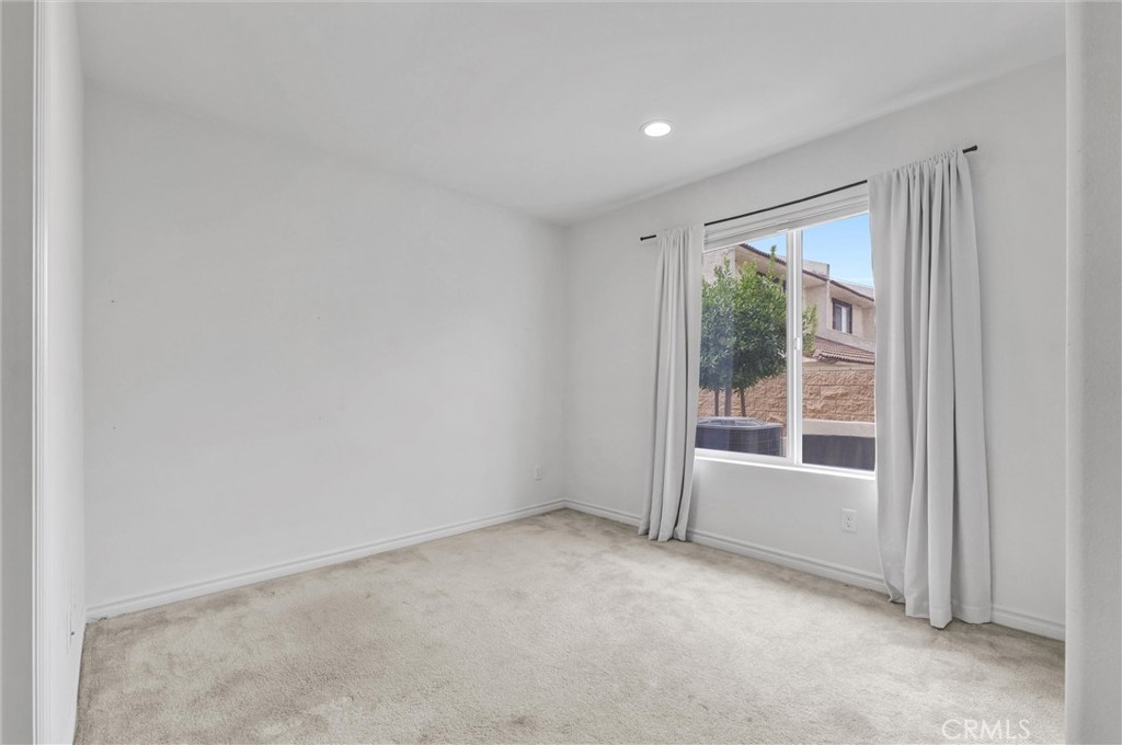 1245 Oliva Court Duarte, CA 91010 - Photo 5 of 23 a view of an empty room with a window
