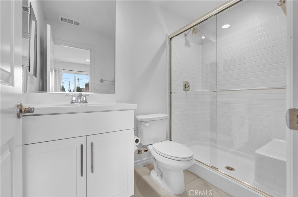 1245 Oliva Court Duarte, CA 91010 - Photo 7 of 23 a bathroom with a sink toilet and shower