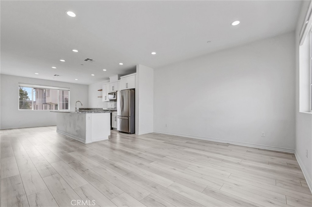1245 Oliva Court Duarte, CA 91010 - Photo 9 of 23 a view of kitchen with refrigerator and window