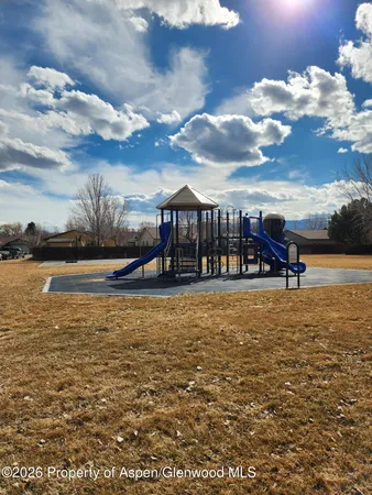 a view of a lake with a big yard