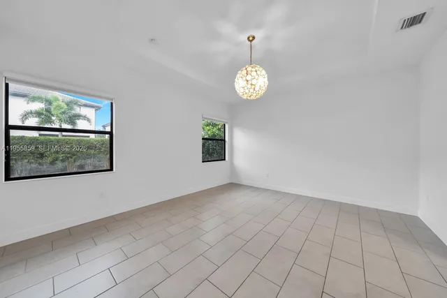 an empty room with windows