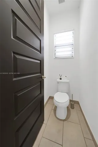 a bathroom with a toilet