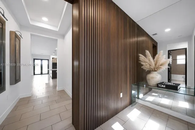 a view of a hallway with workspace