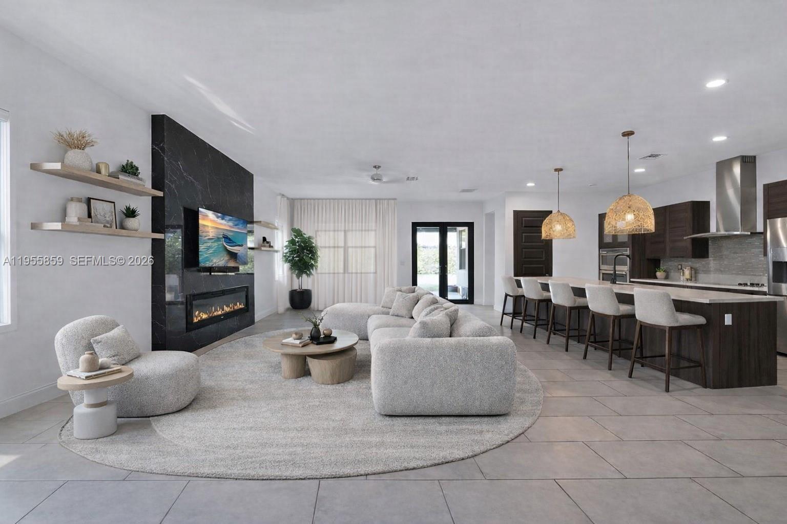 15877 Southwest 136 Way Miami, FL 33196 - Photo 4 of 18 a living room with furniture and flat screen tv