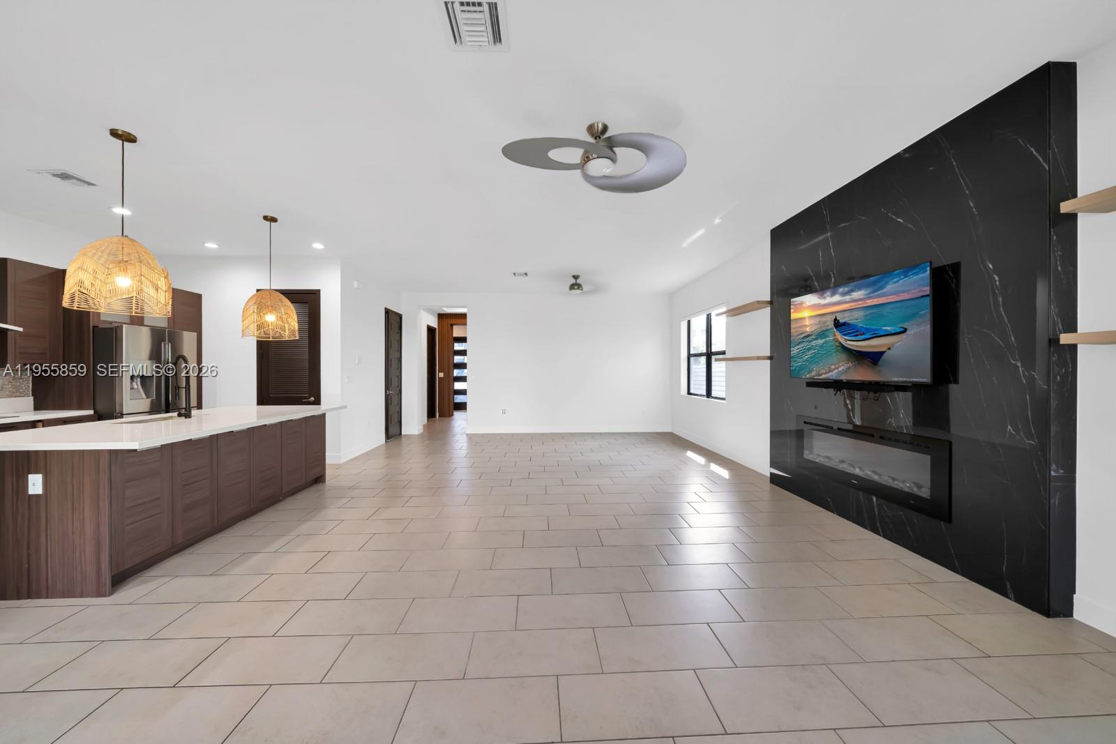 15877 Southwest 136 Way Miami, FL 33196 - Photo 8 of 18 a view of a kitchen and window