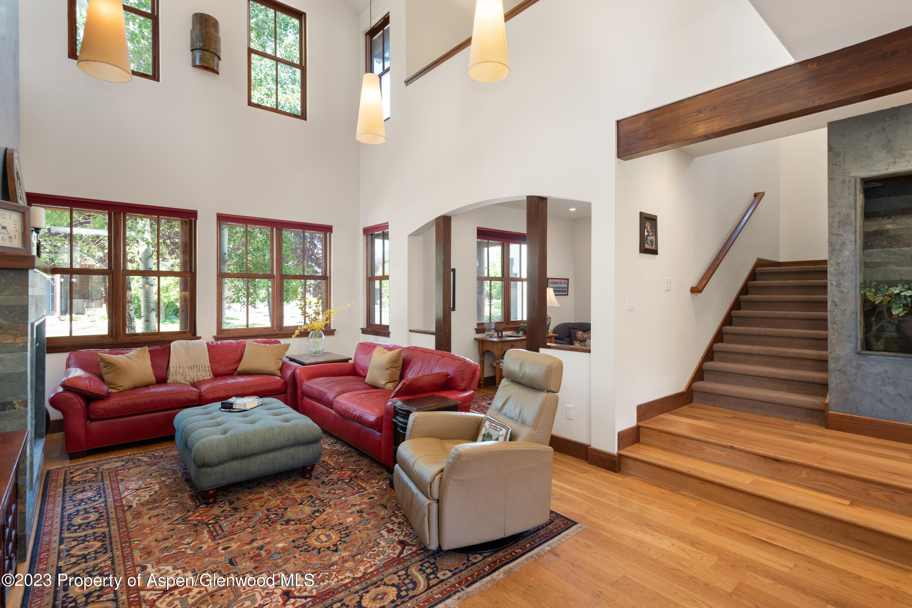 346 Sopris Circle Basalt, CO 81621 - Photo 14 of 25 a living room with furniture and a floor to ceiling window