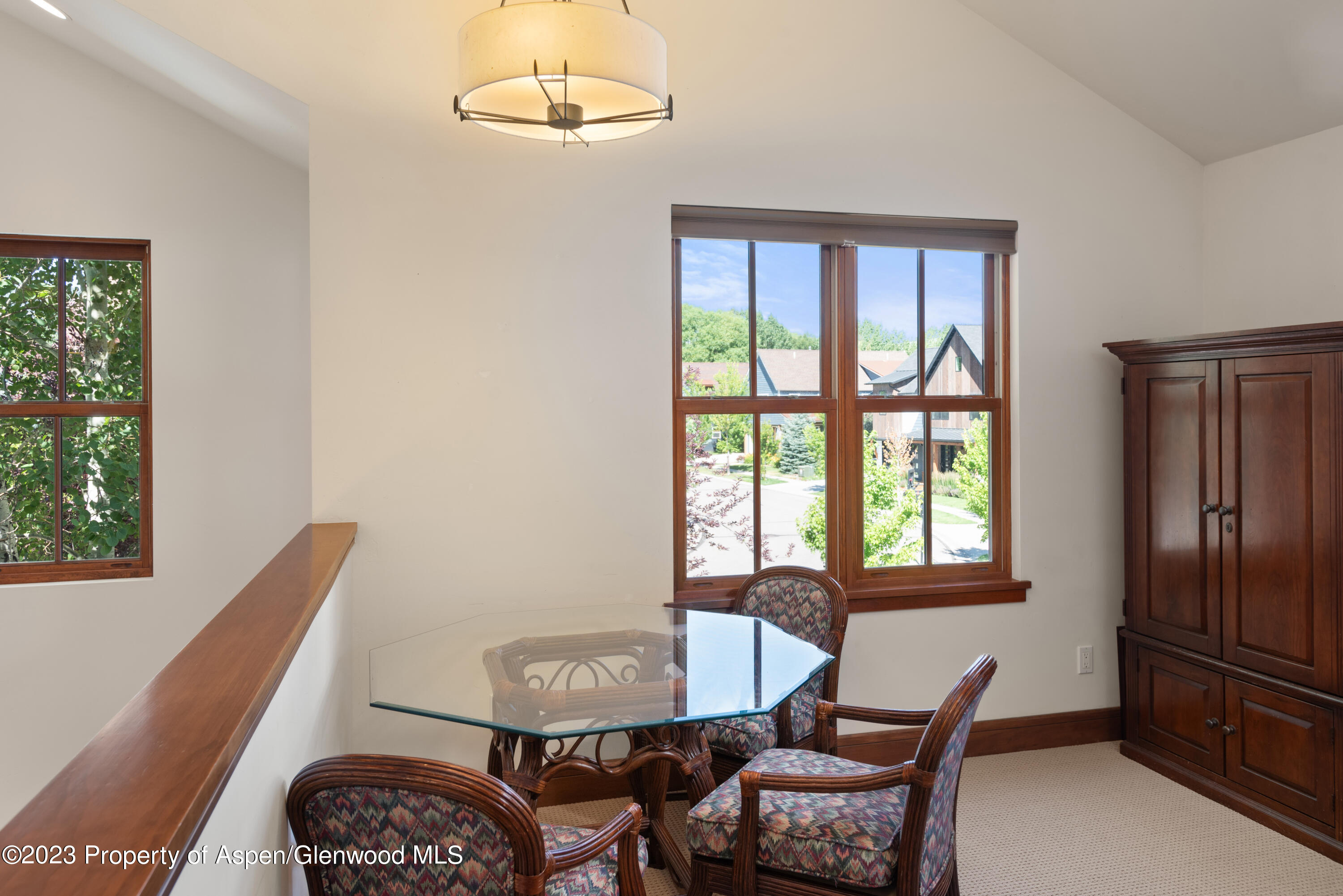 346 Sopris Circle Basalt, CO 81621 - Photo 20 of 25 a view of a dining room with furniture window and outside view