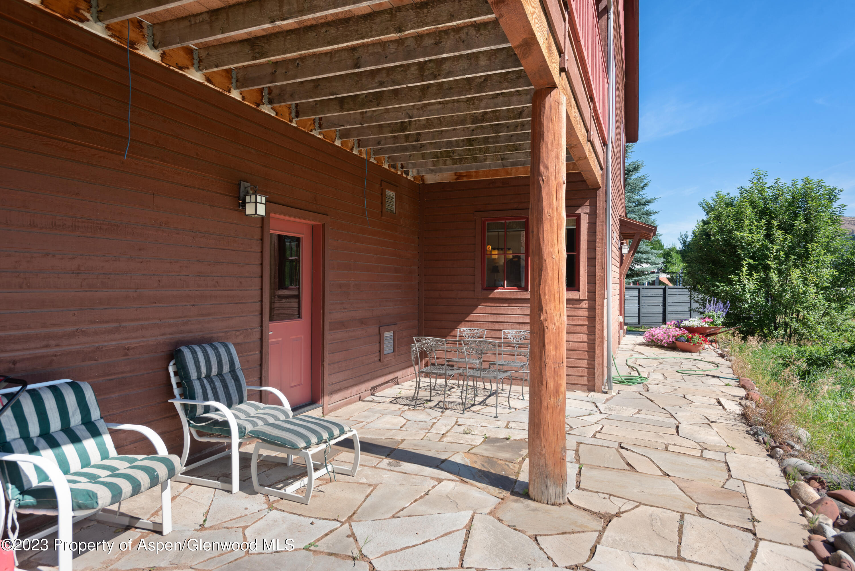 346 Sopris Circle Basalt, CO 81621 - Photo 21 of 25 a outdoor space with patio couches and potted plants