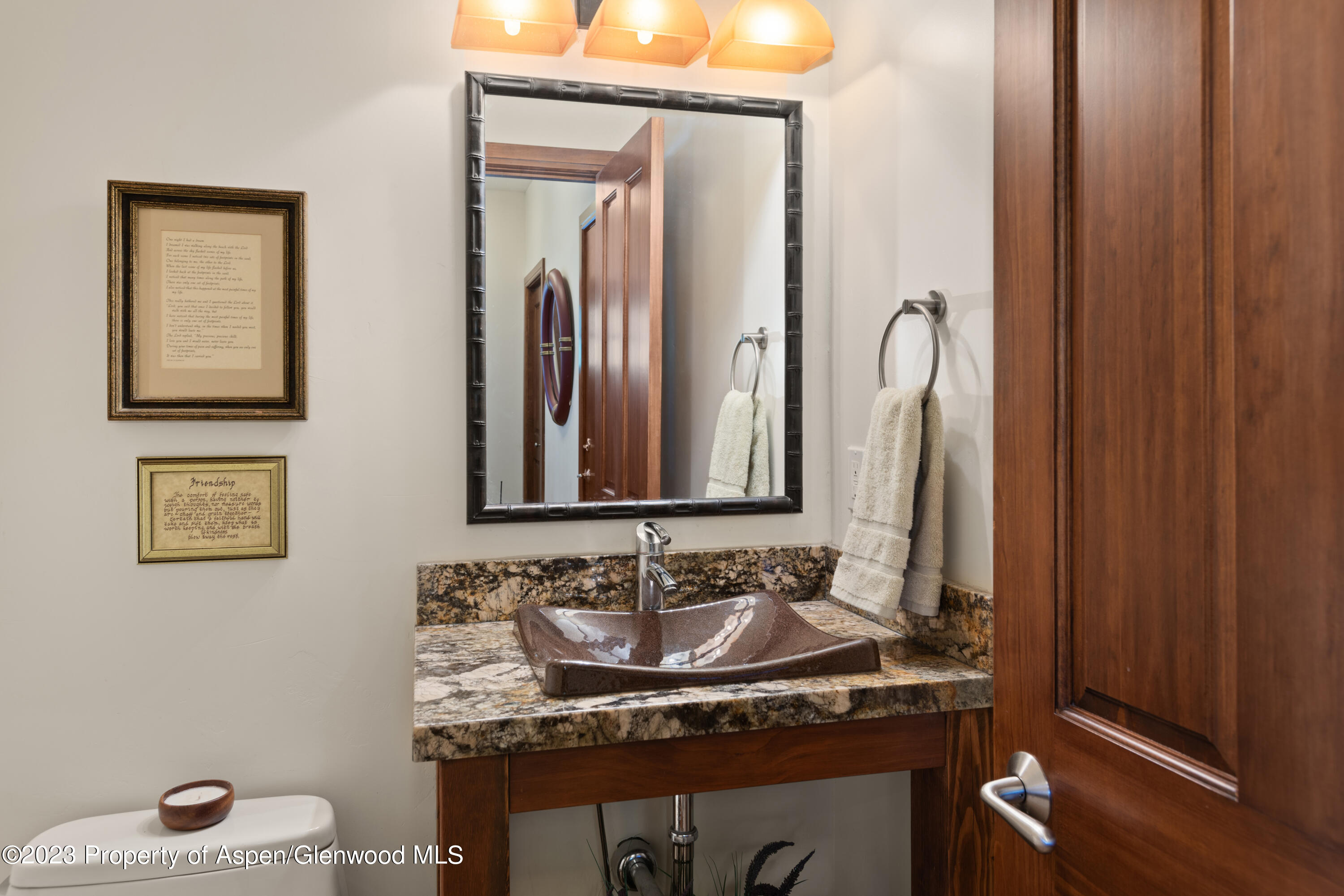346 Sopris Circle Basalt, CO 81621 - Photo 25 of 25 a bathroom with a sink and a mirror