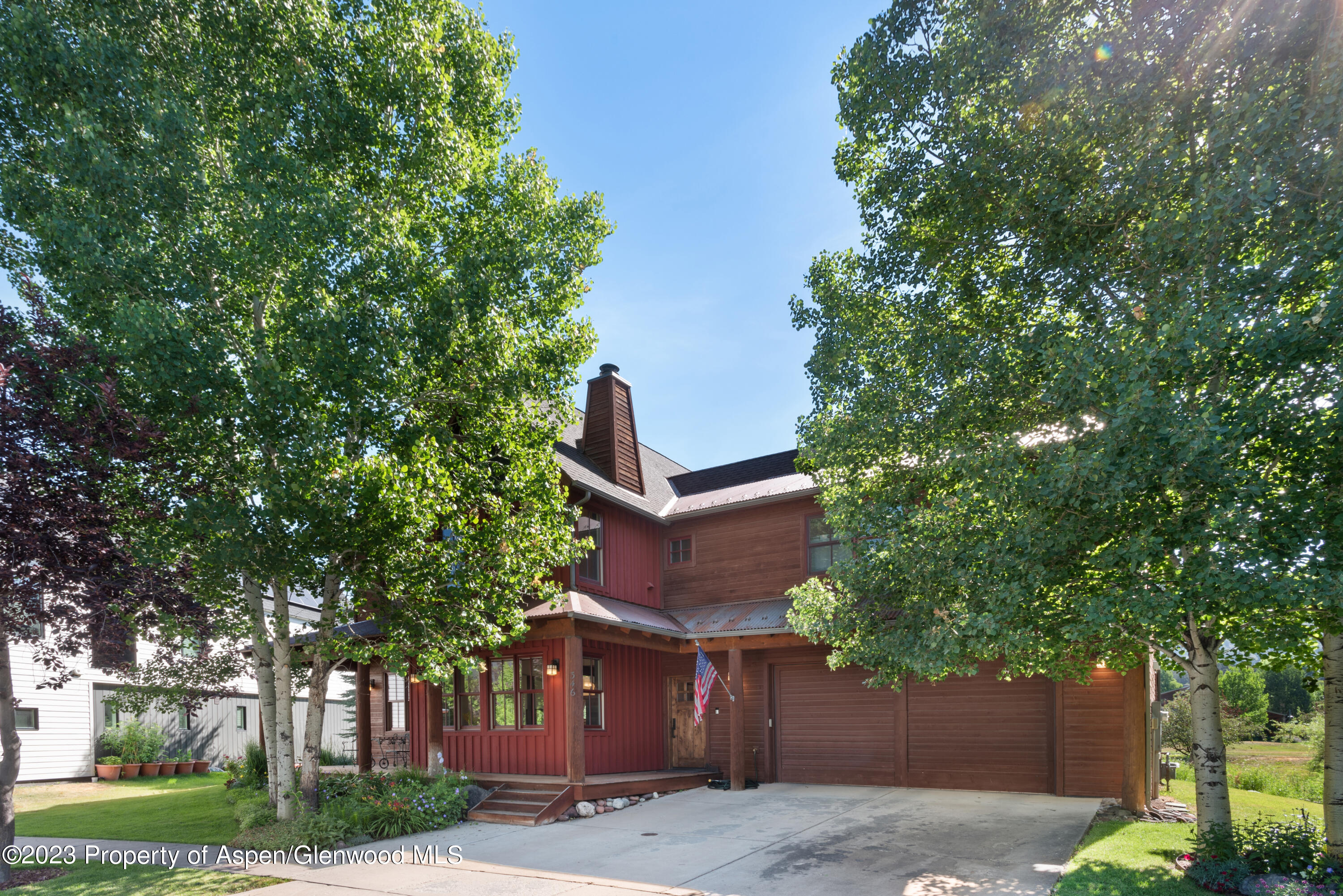 346 Sopris Circle Basalt, CO 81621 - Photo 3 of 25 a front view of a house with a tree