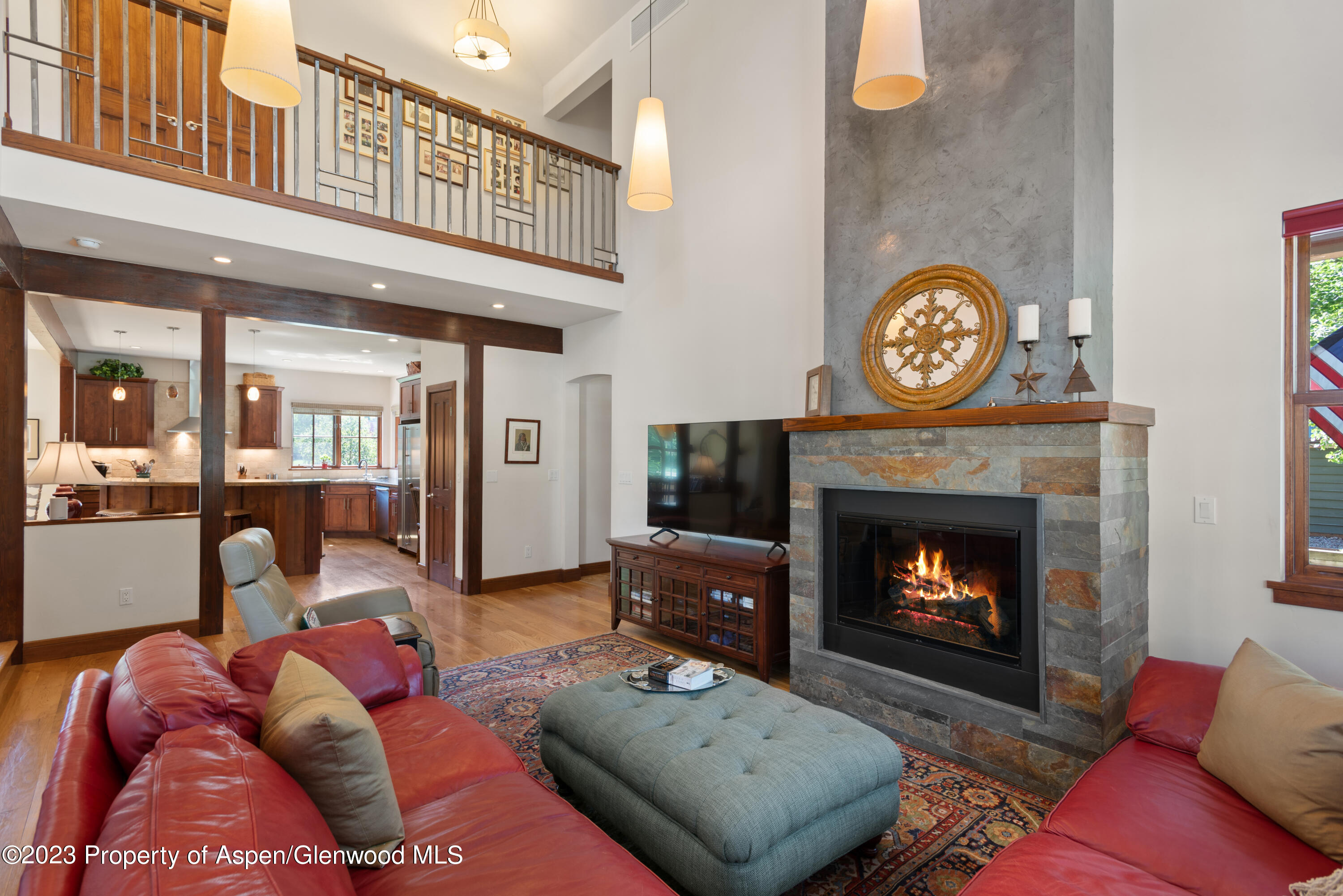 346 Sopris Circle Basalt, CO 81621 - Photo 4 of 25 a living room with furniture and a fireplace