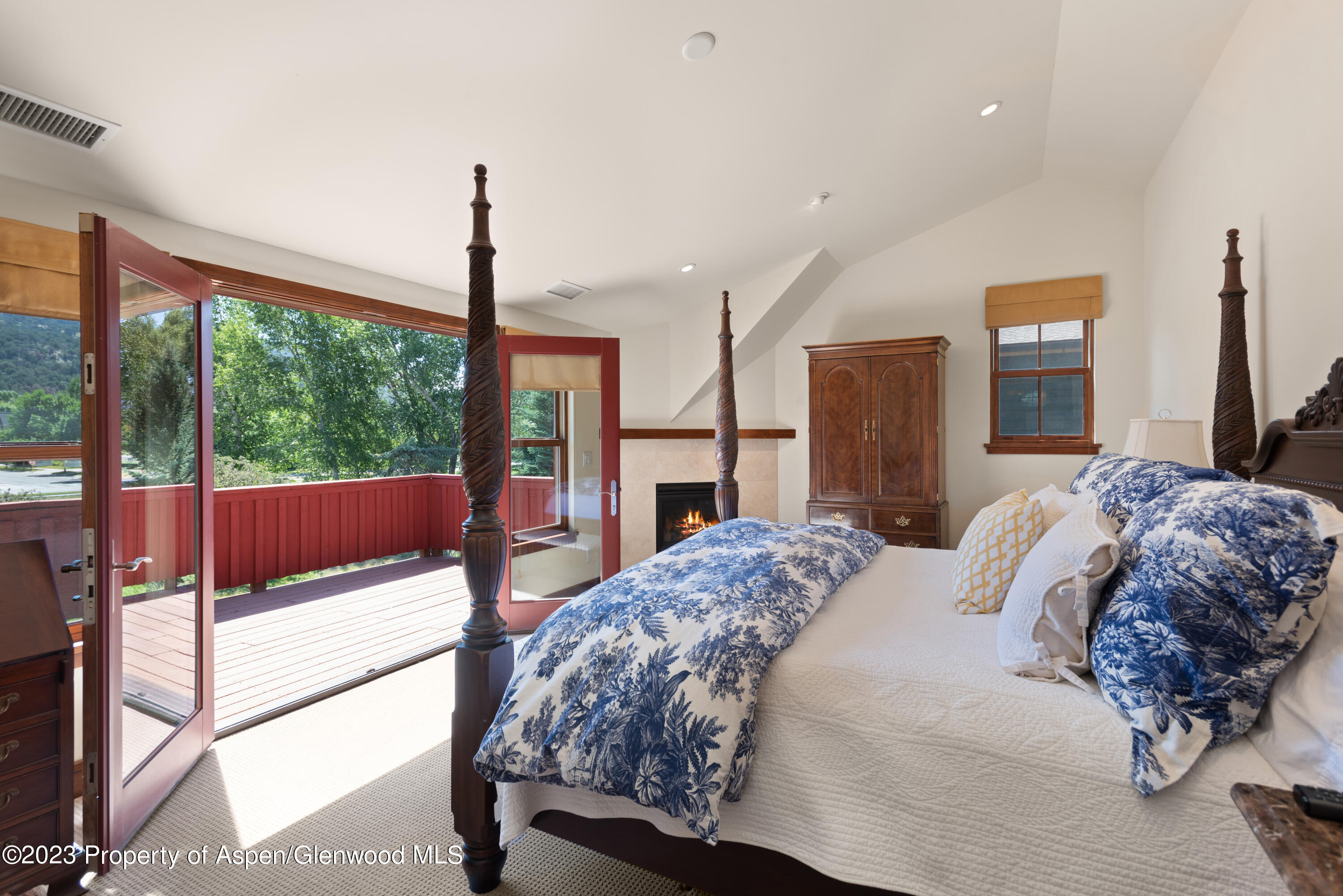 346 Sopris Circle Basalt, CO 81621 - Photo 5 of 25 a bedroom with a large bed and a window