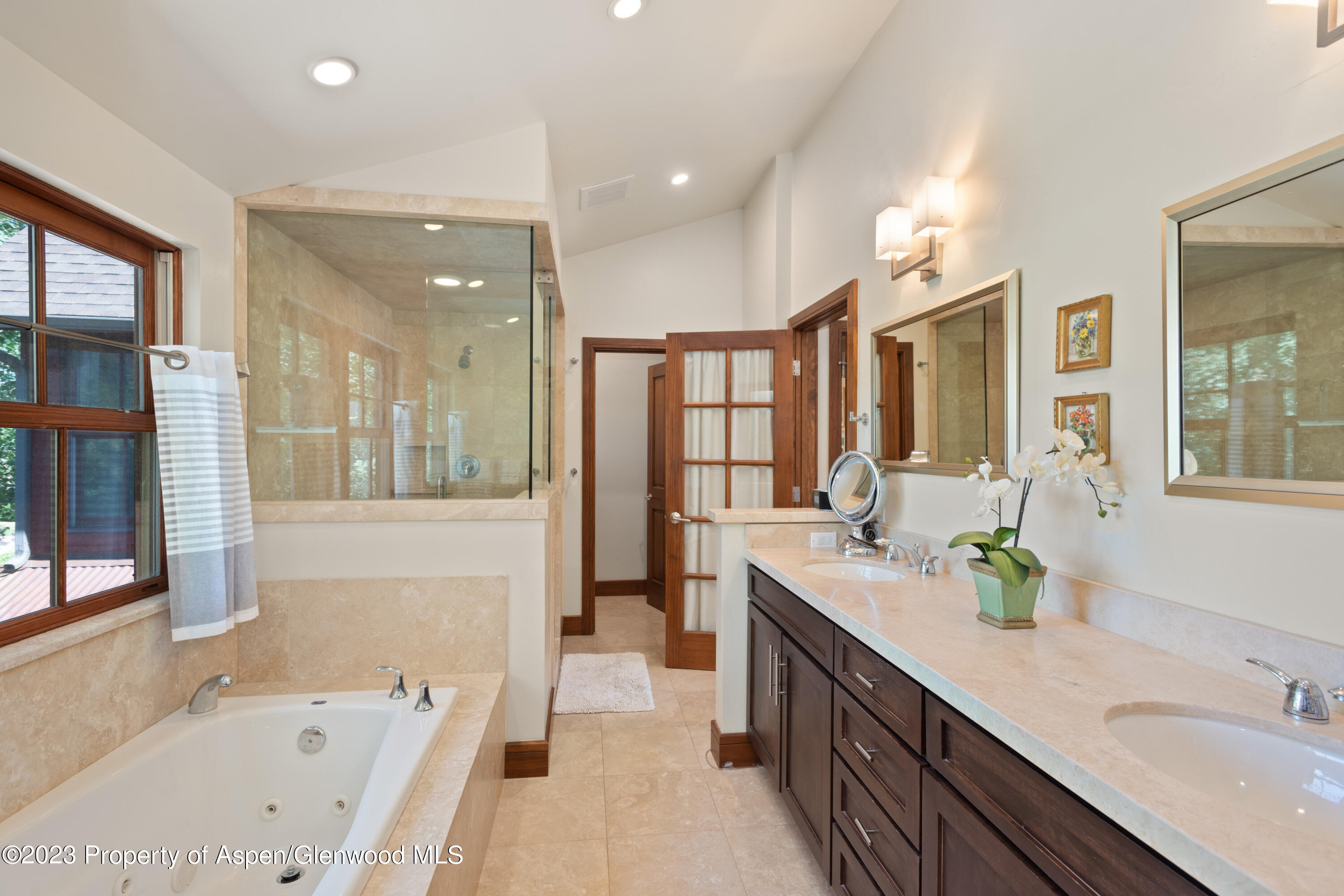 346 Sopris Circle Basalt, CO 81621 - Photo 6 of 25 a spacious bathroom with a tub sink shower and mirror