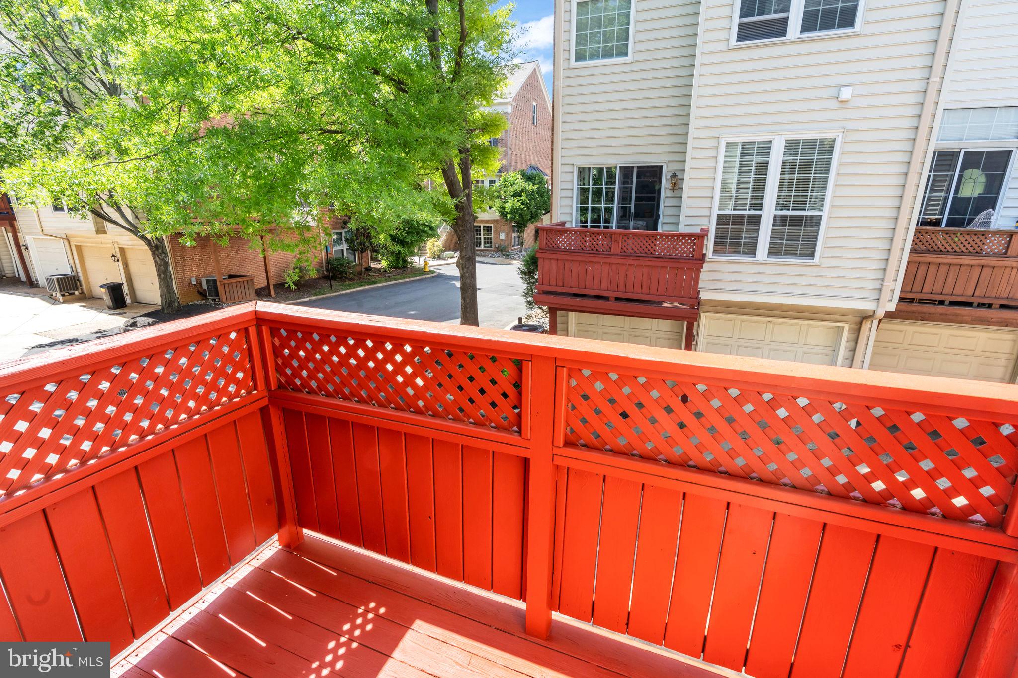 6013 Riddle Walk Alexandria, VA 22312 - Photo 13 of 31 a view of an outdoor sitting area with wooden fence