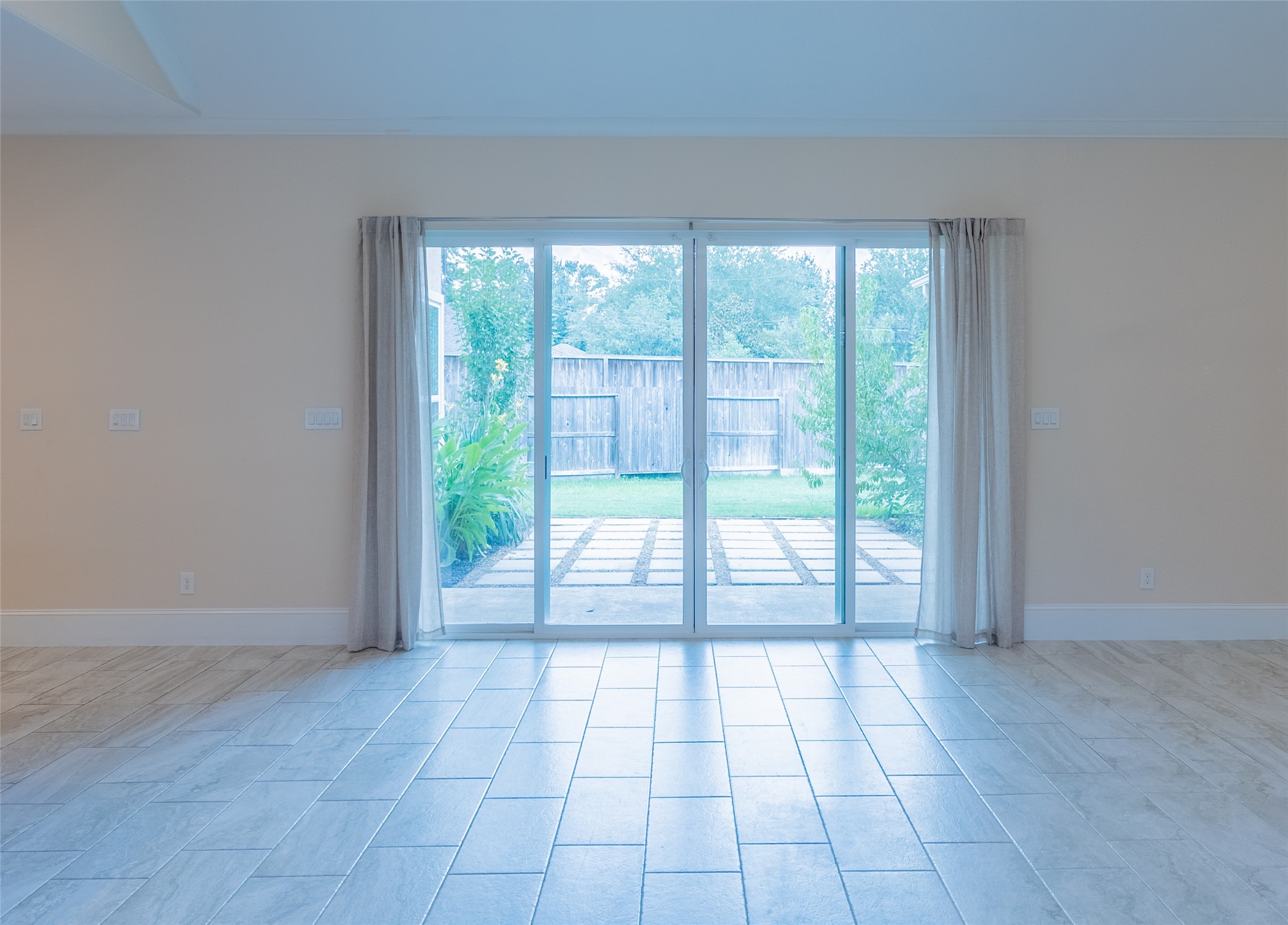 25718 Muirfield Bend Court Spring, TX 77389 - Photo 14 of 50 a view of empty room with wooden floor and fan