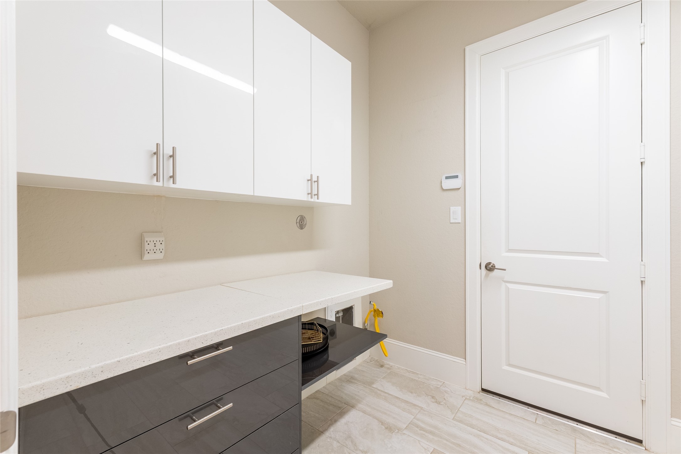 25718 Muirfield Bend Court Spring, TX 77389 - Photo 16 of 50 Laundry room with door to/from garage